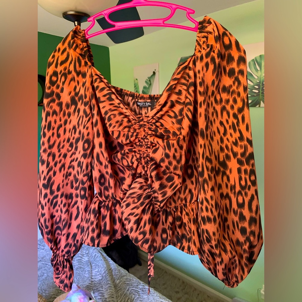 Orange and Black shirt/crop top.